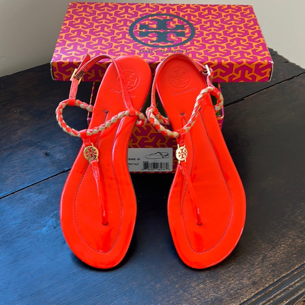 Fun Tory sandal with woven accents.